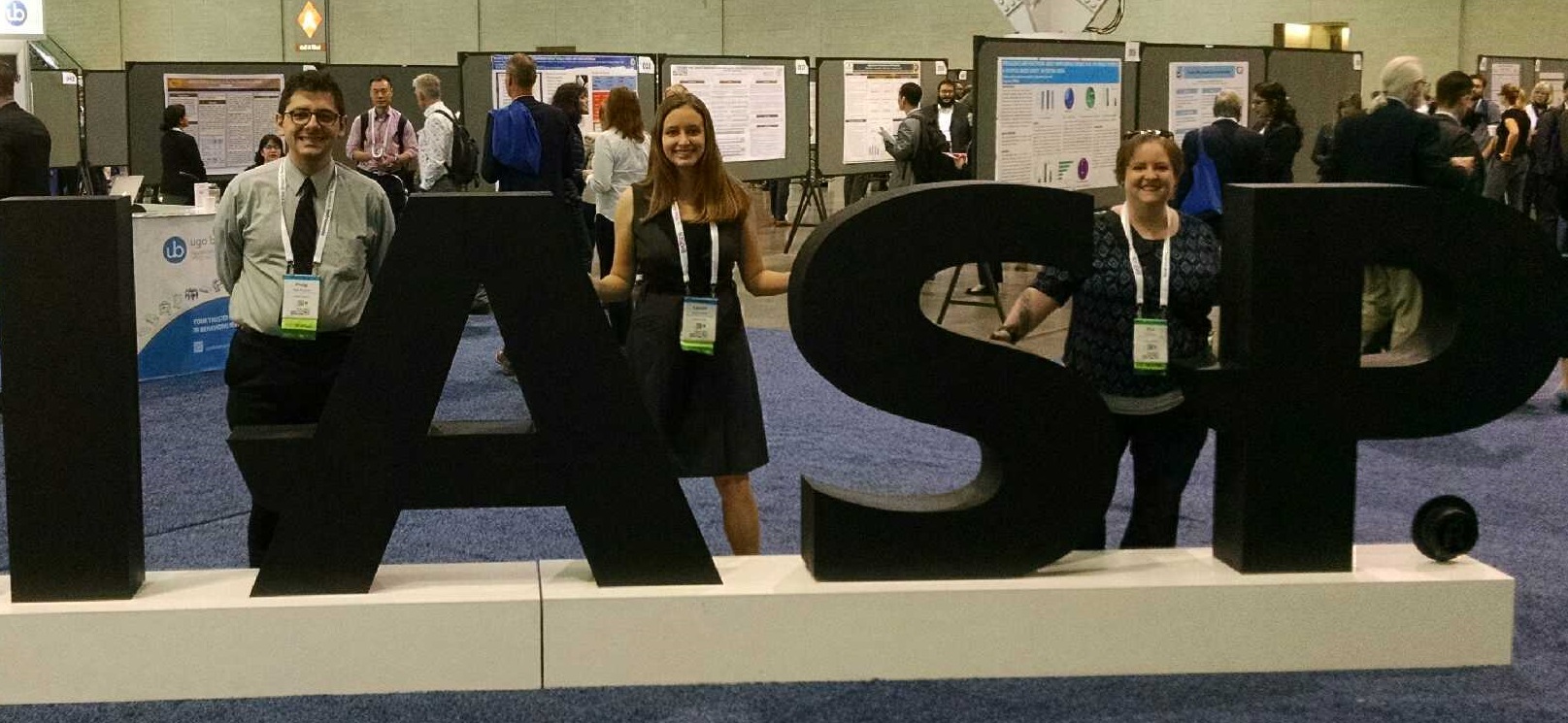 Lauren Mehok with IASP sign